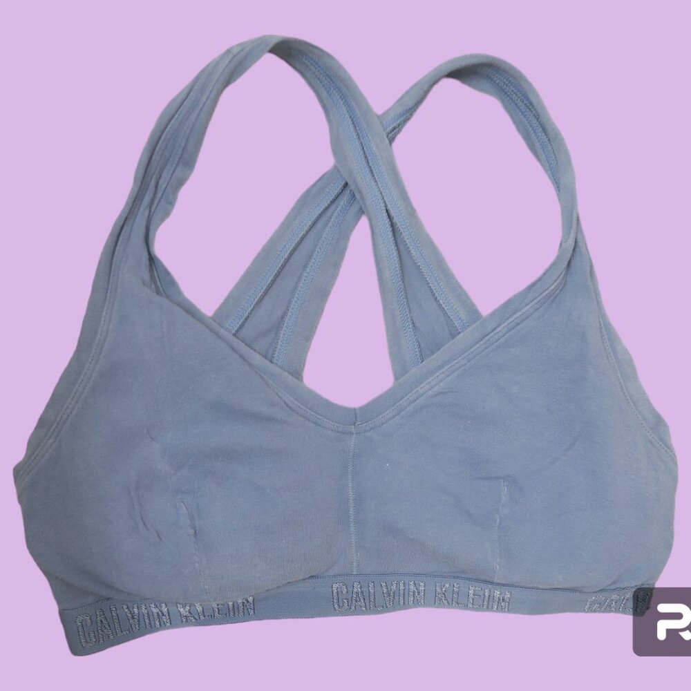 Calvin Klein criss cross back sports bra in blue. Tag has been removed small